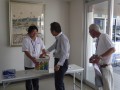 会場入り口では営業課の坂本匡平さんが来場会員に募金を呼びかけた