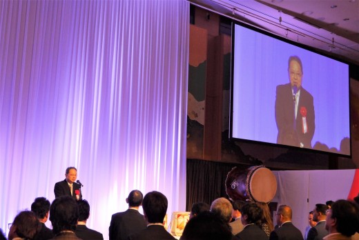 日本オートオークション協議会の荒井寿一会長が祝辞を述べた