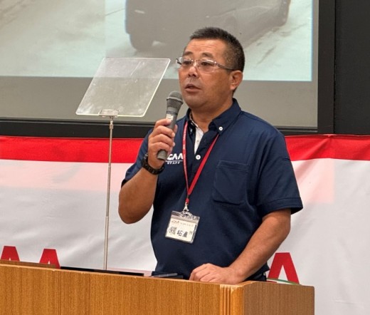 東北会場初の周年記念であいさつに立つ柘植取締役
