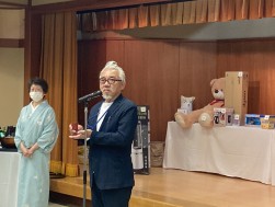 前夜祭であいさつを述べるＪＵ中四国の中西信夫指導環境委員長
