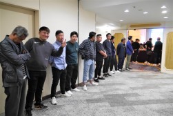 懇親会場ではＪＵ鹿児島の青年部会メンバーが来場者を迎えた