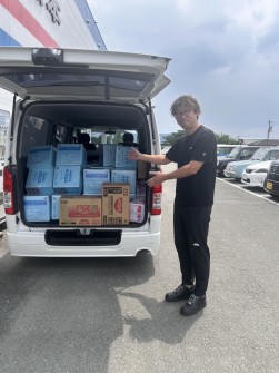 木場代表幹事は荷室に満載の支援物資を届けた（写真提供＝ＪＵ熊本）