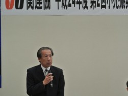挨拶に立つ高谷昭彦ＪＵ関連協小売振興委員長
