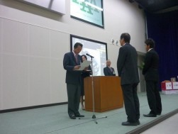 23 日開催で謝意を述べる阪口勝正課長