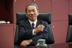 記者会見で、磯﨑孝流通委員長