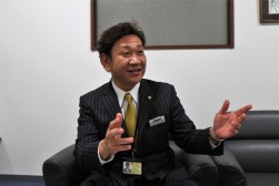 買取事業の背景を語る川口小売政策委員長