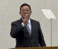 あいさつに立つ斉藤社長