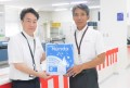 写真左から越智副会場長と郡会場長
