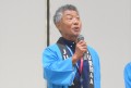 セリ前にあいさつを述べる小久保筆頭副理事長