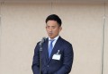 食事会であいさつを述べるシティライト丸山副社長