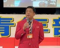 あいさつに立つ橋本理事長