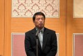 年頭のあいさつに立つ橋本会長理事長