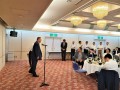 決起大会であいさつする上田会長