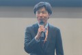 あいさつを述べる勝嵜流通委委員長