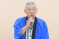 あいさつを述べる吉田流通委員長