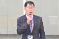 来賓を代表してあいさつを述べるＪＵ中部・加藤検査委員長