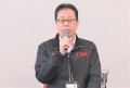 セリ前にあいさつを述べる新井会場長