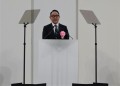 総会後の懇親会であいさつに立つ豊田会長