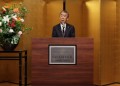 総会冒頭であいさつに立つ萩原会長