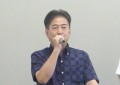 あいさつに立つ室田流通委員長