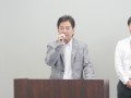 あいさつに立つ室田流通委員長