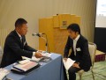 大堀健二社長（写真左）が自らロープレを行い理解を促した