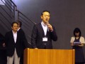 挨拶に立つ宮崎理事長