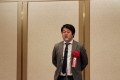 挨拶に立つ磯貝代表理事