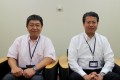 大塚執行役員（右）と堀内会場長（左）