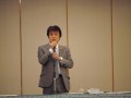 岡小売振興委員長が挨拶