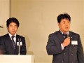 ＪＵ広島青年部主催講演会の冒頭挨拶する森田部会長（写真右）と司会進行を務めた室田尚樹副部会長（同左）