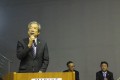 祝辞を述べるJU関連協・高谷会長