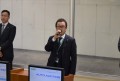 セリ前のセレモニーで挨拶を述べる口野青年部会長