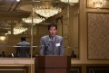 AA前日に開催した「感謝の集い」で挨拶を述べる兼松理事長