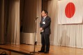 乾杯挨拶をする荒井商事・荒井会長